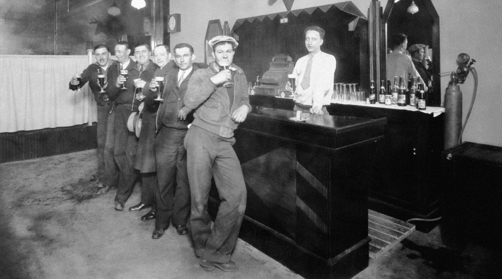 Vintage photograph of gentlemen at a bar